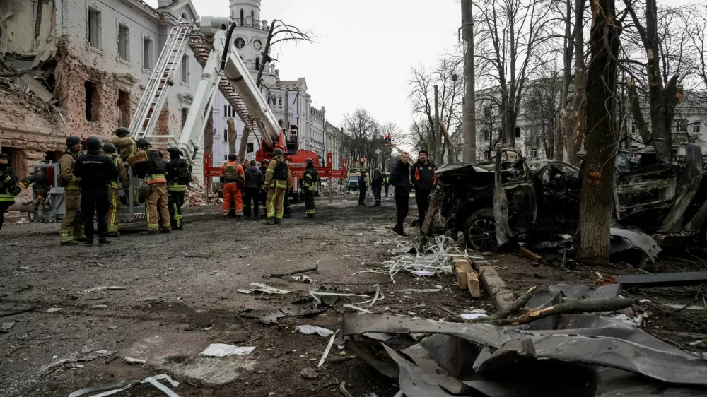 Members of emergency services work at the site of a Russian missile strike, amid Russia's attack on Ukraine, in Sumy, Ukraine April 13, 2025. REUTERS/Sofiia Gatilova