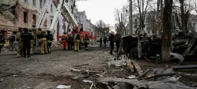 Members of emergency services work at the site of a Russian missile strike, amid Russia's attack on Ukraine, in Sumy, Ukraine April 13, 2025. REUTERS/Sofiia Gatilova
