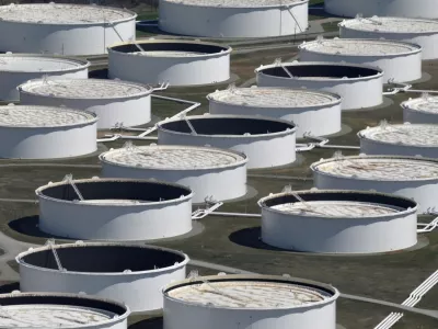 FILE PHOTO: Crude oil storage tanks are seen from above at the Cushing oil hub, Oklahoma, March 24, 2016. REUTERS/Nick Oxford//File Photo