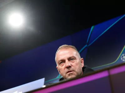 14 April 2025, North Rhine-Westphalia, Dortmund: Barcelona Coach Hansi Flick attends a press conference, ahead of Tuesday's UEFA Champions League quarter-final second leg soccer match against Borussia Dortmund. Photo: Bernd Thissen/dpa