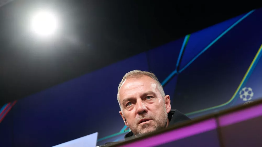 14 April 2025, North Rhine-Westphalia, Dortmund: Barcelona Coach Hansi Flick attends a press conference, ahead of Tuesday's UEFA Champions League quarter-final second leg soccer match against Borussia Dortmund. Photo: Bernd Thissen/dpa