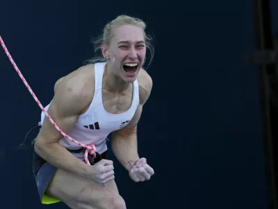Janja Garnbret of Slovenia reacts after winning the gold during the women's boulder and lead final for the sport climbing competition at the 2024 Summer Olympics, Saturday, Aug. 10, 2024, in Le Bourget, France. (AP Photo/Tsvangirayi Mukwazhi)