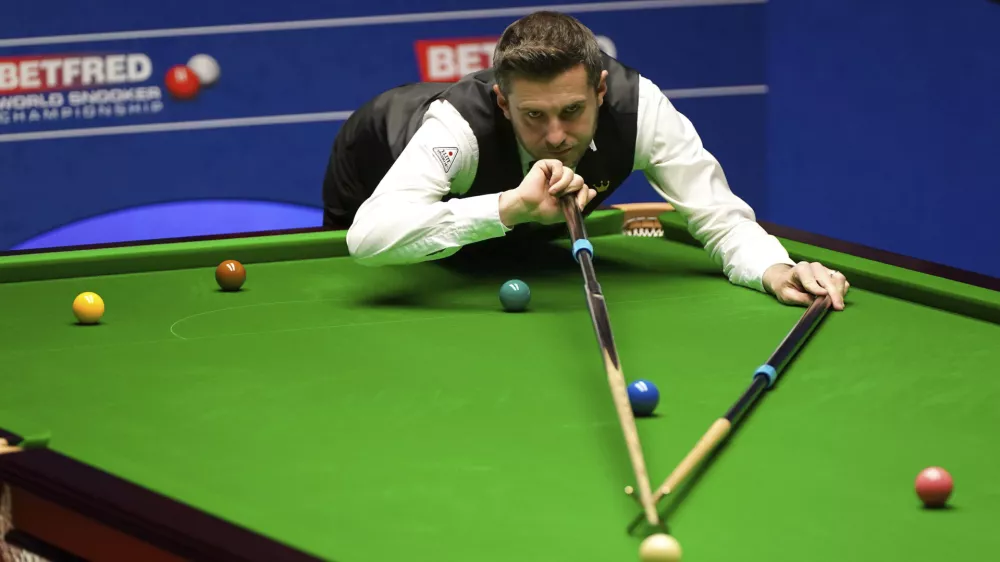 England's Mark Selby plays a shot on the way to winning the World Snooker Championships at the Crucible Theatre in Sheffield, England, Monday, May 3, 2021. (Zac Goodwin/PA via AP)