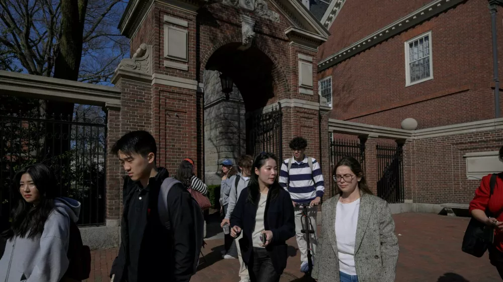 Students walk on the campus of Harvard University in Cambridge, Massachusetts, U.S., April 15, 2025.  REUTERS/Faith Ninivaggi