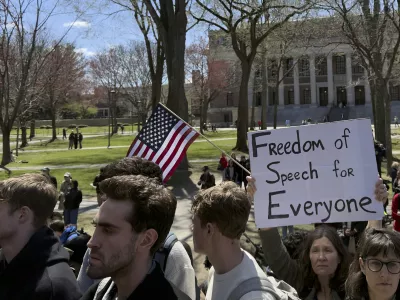 Students, faculty and members of the Harvard University community rally, Thursday, April 17, 2025, in Cambridge, Mass. (AP Photo)