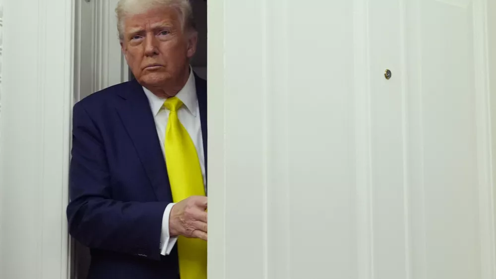 President Donald Trump arrives at a swearing in ceremony for Dr. Mehmet Oz to be Administrator of the Centers for Medicare and Medicaid Services, in the Oval Office of the White House, Friday, April 18, 2025, in Washington. (AP Photo/Alex Brandon)