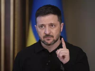 Ukrainian President Volodymyr Zelenskyy speaks during a briefing in Kyiv, Ukraine, Thursday, April 17, 2025. (AP Photo/Efrem Lukatsky)