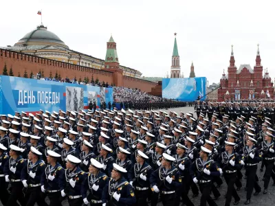 Russian service members march during a military parade on Victory Day, which marks the 76th anniversary of the victory over Nazi Germany in World War Two, in Red Square in central Moscow, Russia May 9, 2021. REUTERS/Maxim Shemetov