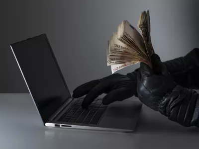 Hacker steal funds with computer.