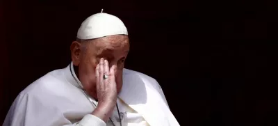 Pope Francis appears on a balcony on the day the "Urbi et Orbi" (to the city and to the world) message is delivered, at St. Peter's Square, on Easter Sunday, in the Vatican, April 20, 2025. REUTERS/Yara Nardi   TPX IMAGES OF THE DAY