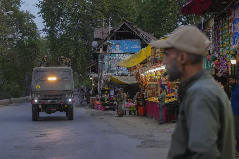 Indian security officers patrol in armored vehicle near Pahalgam in south Kashmir after assailants indiscriminately opened fired at tourists visiting Pahalgam, Indian controlled Kashmir, Tuesday, April 22, 2025.(AP Photo/Dar Yasin)