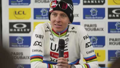 Tadej Pogacar, of Slovenia, speaks with the media after finishing second in the Paris-Roubaix cycling race in Roubaix, France, Sunday, April 13, 2025. (AP Photo/Thibault Camus)
