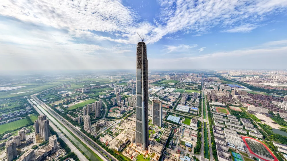 The 597-meter high Goldin Finance 117 Tower, known as the world's first unfinished building, is pictured in Tianjin, China, on August 28, 2024. The construction of Goldin Finance 117 Building in Xiqing District, Tianjin, begins in September 2008, and on September 8, 2015, Goldin Finance 117 completes the main structure. Goldin Finance 117 becomes an unfinished building, stalled by Goldin's plunging market value and poor sales. (Photo by Costfoto/NurPhoto via Getty Images)