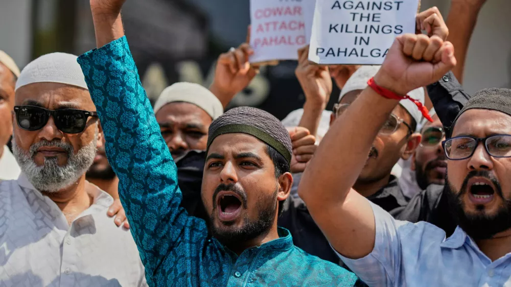 Muslims shout slogans after Friday prayers during a protest against the killing of tourists by militants near Pahalgam in Indian controlled Kashmir, in Guwahati, India, Friday, April 25, 2025. (AP Photo/Anupam Nath)