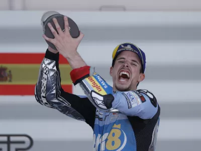 MotoGP - Spanish Grand Prix - Circuito de Jerez, Jerez, Spain - April 27, 2025 BK8 Gresini Racing MotoGP's Alex Marquez celebrates on the podium with the trophy after winning the race REUTERS/Jon Nazca