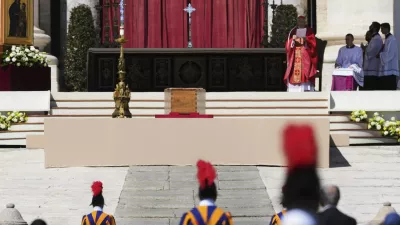 The coffin of Pope Francis is placed on the ground in St Peter's Square for his funeral, at the Vatican, Saturday, April 26, 2025. (AP Photo/Andrew Medichini)