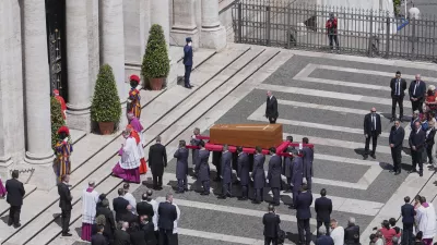 The coffin of Pope Francis is carried inside St. Mary Major Basilica for his burial ceremony, in Rome, Saturday, April 26, 2025. (AP Photo/Antonietta Baldassarre)