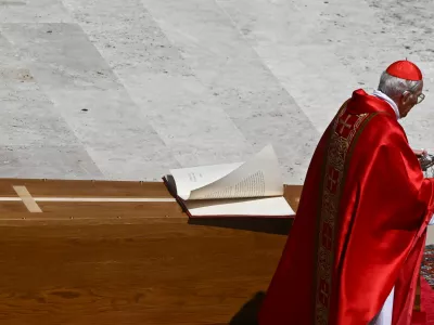 Cardinal Giovanni Battista Re blesses the coffin as he leads the funeral Mass of Pope Francis, in Saint Peter's Square, at the Vatican, April 26, 2025. REUTERS/Dylan Martinez