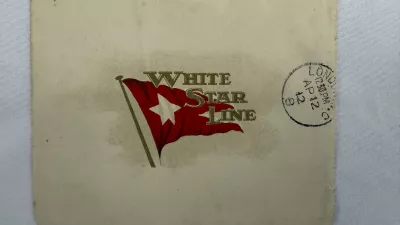 This undated handout picture provided by the auctioneers Henry Aldridge & Son, England, shows a lettercard, penned by one of the Titanic's most well-known survivors from onboard the ship days before it sank, which has sold for 300,000 pounds (9,000) at auction. (Henry Aldridge & Son via AP)