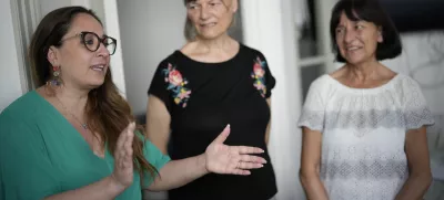 Lawyer Laura Sgro', left, talks to Mirjam Kovac, center, and Gloria Branciani, as they arrive for an interview with the Associated Press, in Rome, Friday, June 28, 2024. Kovac and Branciani are two of five women who urged Catholic bishops around the world to remove from their churches mosaics by ex-Jesuit artist Rev. Marko Rupnik after they accused him of psychologically, spiritually and sexually abusing them. (AP Photo/Andrew Medichini)