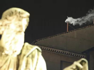 White smoke rises from the chimney above the Sistine Chapel in the Vatican, indicating a new pope has been elected at the Vatican March 13, 2013. White smoke rose from the Sistine Chapel and the bells of St. Peter's Basilica rang out on Wednesday, signaling that Roman Catholic cardinals elected a pope to succeed Benedict XVI. REUTERS/Tony Gentile (VATICAN - Tags: RELIGION)