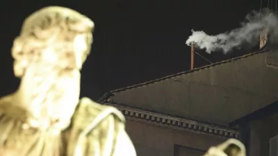 White smoke rises from the chimney above the Sistine Chapel in the Vatican, indicating a new pope has been elected at the Vatican March 13, 2013. White smoke rose from the Sistine Chapel and the bells of St. Peter's Basilica rang out on Wednesday, signaling that Roman Catholic cardinals elected a pope to succeed Benedict XVI. REUTERS/Tony Gentile (VATICAN - Tags: RELIGION)