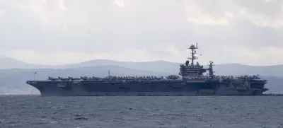 FILE - Aircraft carrier USS Harry S. Truman is moored near Split, Croatia, Feb. 14, 2022. (AP Photo/Darko Bandic, File)