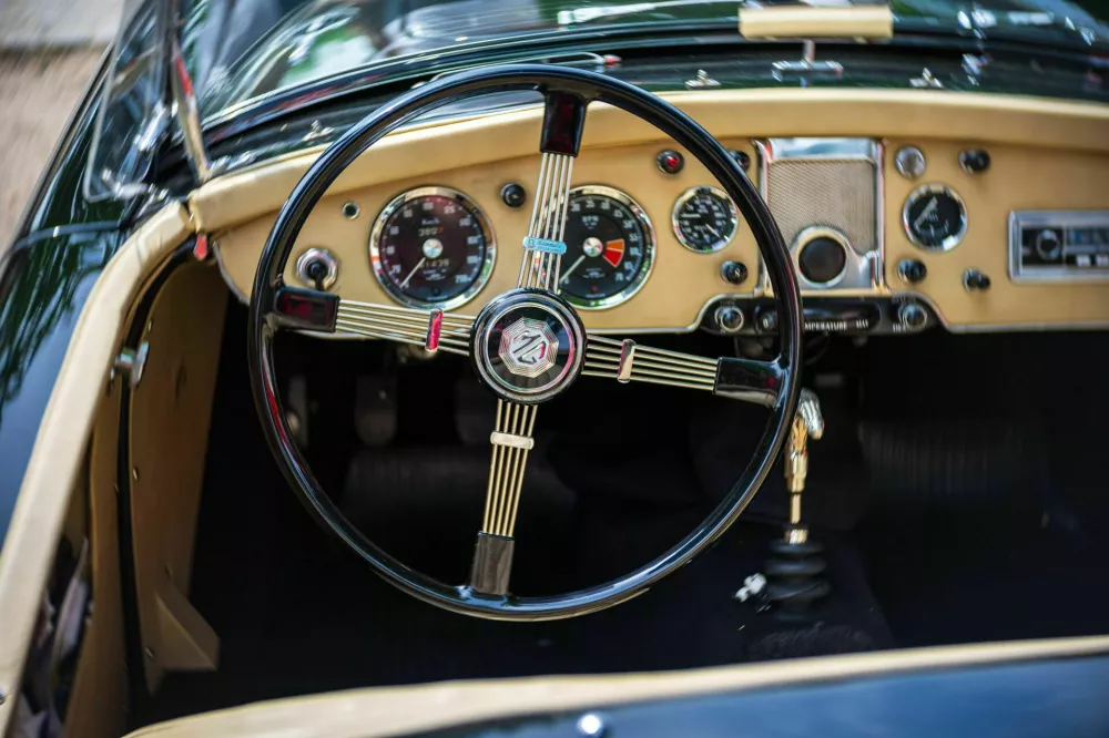 2WF0T7P WERDER (HAVEL), GERMANY - MAY 20, 2023: The interior of a sports car MG MGA. Swirl bokeh. Art lens. Oldtimer - Festival Werder Classics 2023