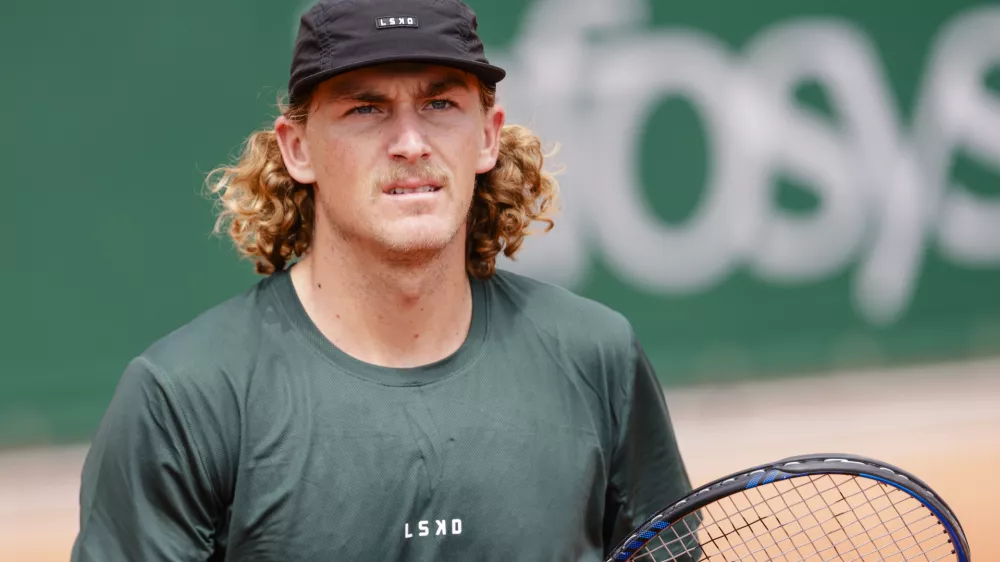 FILED - 27 May 2024, France, Paris: Australian tennis player Max Purcell in action against Germany's Henri Squire during their men's singles first round match of the French Open tennis Tournament in Paris. Purcell will not be allowed to participate in or attend tournaments until mid-2026 because of his doping violation. Photo: Frank Molter/dpa