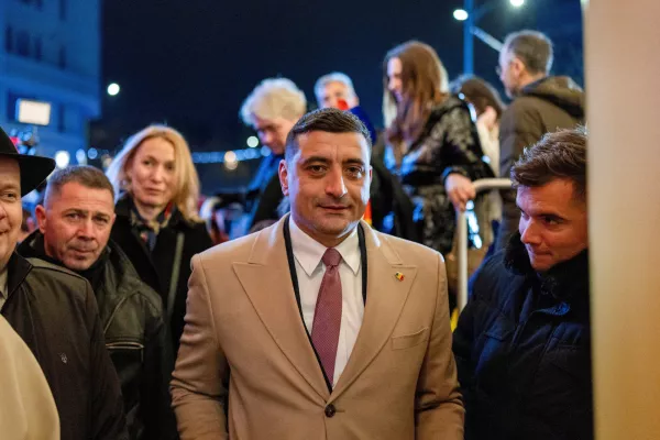 FILE PHOTO: The leader of the radical right Alliance for Uniting Romanians (AUR) party, George Simion, looks on following initial exit polls at the party's campaign headquarters on the day of the parliamentary election, in Bucharest, Romania, December 1, 2024. REUTERS/Alkis Konstantinidis/File Photo