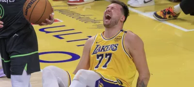 April 30, 2025, Los Angeles, California, USA: Luka Doncic #77 of the Los Angeles Lakers goes down hard as he clashes with Donte DiVincenzo #0 of the Minnesota Timberwolves goes to the basket during Round One Game Five of the 2025 NBA Playoffs on Wednesday April 30, 2025 at Crypto.com Arena in Los Angeles, California. JAVIER ROJAS/PI,Image: 994172760, License: Rights-managed, Restrictions:, Model Release: no