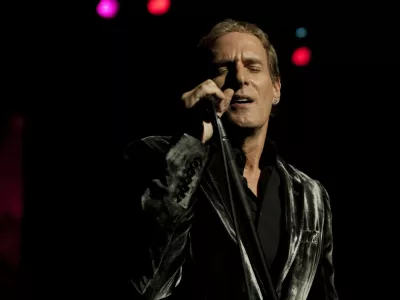 michael bolton performing live at the royal albert hall on mon the 2nd nov 2009 he is an american singer/songwriter whos hard rock band "blackjack" toured with ozzy osborne his solo career began in 1975 but success came in the late 80s early 90s with his album "time,love and tenderness" which featured his grammy award winning cover of the motown classic "when a man loves a women" his latest album featuring other artists such as lady gaga and ne-yo was released in sept 2009 and is called "one world one love".,,Image: 40377411, License: Rights-managed, Restrictions:, Model Release: no