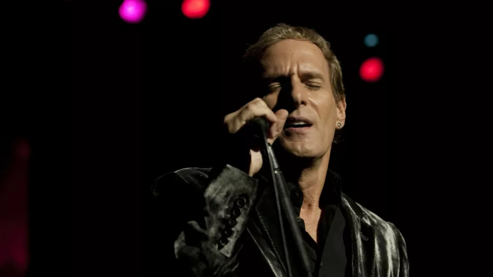 michael bolton performing live at the royal albert hall on mon the 2nd nov 2009 he is an american singer/songwriter whos hard rock band "blackjack" toured with ozzy osborne his solo career began in 1975 but success came in the late 80s early 90s with his album "time,love and tenderness" which featured his grammy award winning cover of the motown classic "when a man loves a women" his latest album featuring other artists such as lady gaga and ne-yo was released in sept 2009 and is called "one world one love".,,Image: 40377411, License: Rights-managed, Restrictions:, Model Release: no