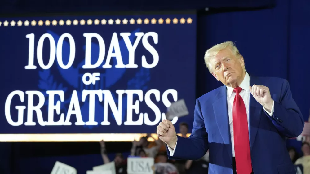 President Donald Trump arrives to speak on his first 100 days at Macomb County Community College Sports Expo Center, Tuesday, April 29, 2025, in Warren, Mich. (AP Photo/Alex Brandon)