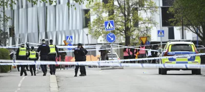 Police at the scene after a shooting incident, at Vaksala Square, in central Uppsala, Sweden, Tuesday, April 29, 2025. (Fredrik Sandberg/TT News Agency via AP)