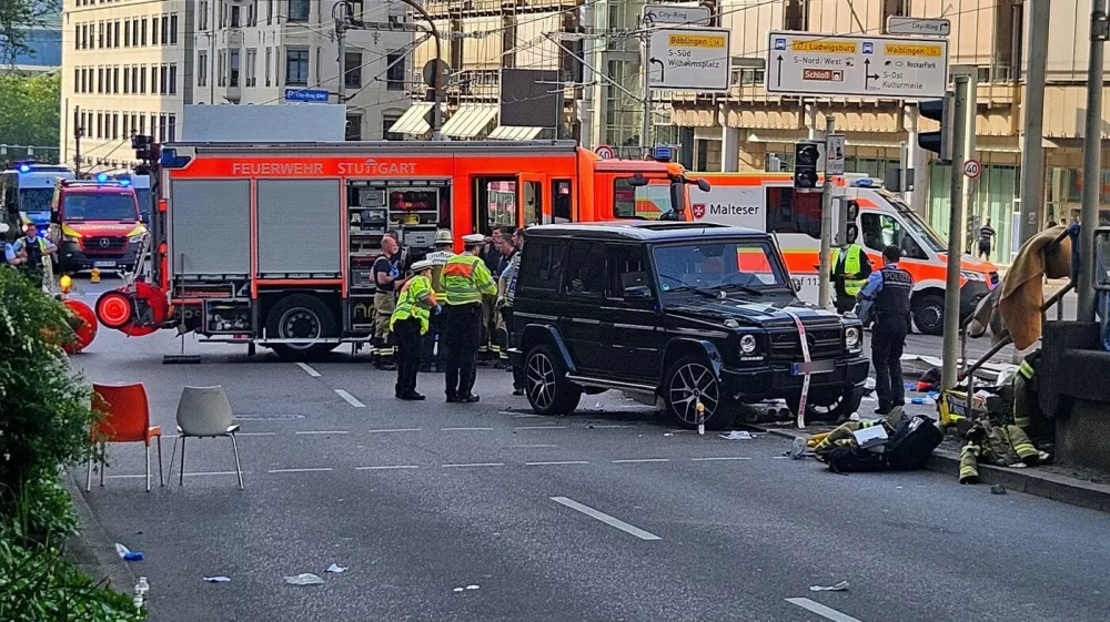 02 May 2025, Baden-W&uuml;rttemberg, Stuttgart: According to police, a car has driven into a group of people in Stuttgart city center. Three people have been injured so far. The driver has been arrested, a police spokeswoman said. Photo: Andreas Rosar/dpa,Image: 994583178, License: Rights-managed, Restrictions: GERMANY OUT, Model Release: no