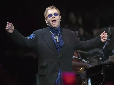 Elton John performs during his concert at the Bell Center in Montreal Saturday Nov.11, 2006. (AP PhotoRyan Remiorz, CP)