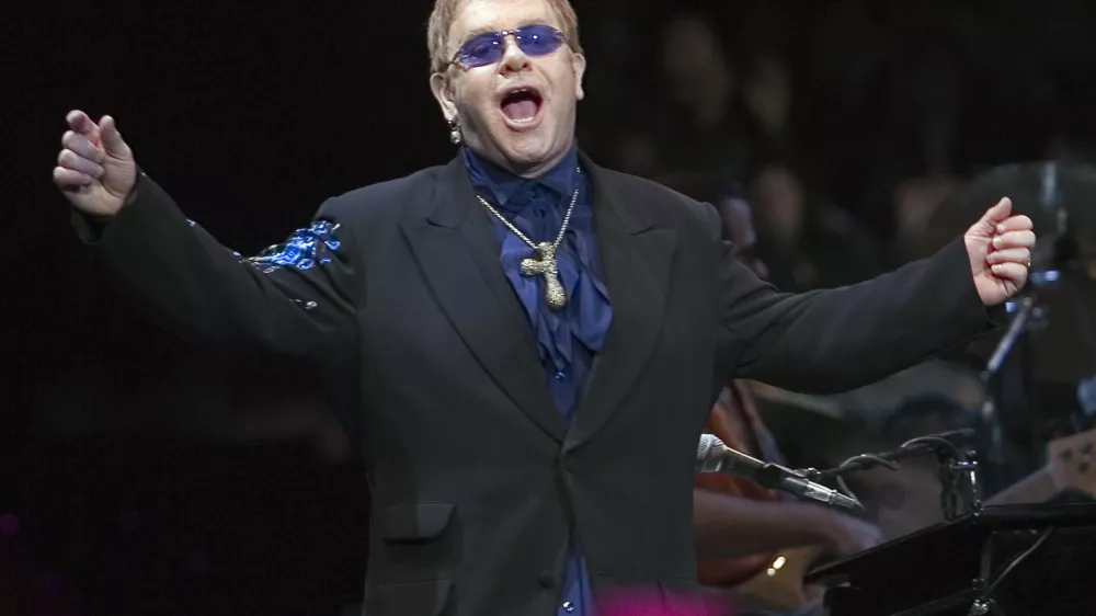 Elton John performs during his concert at the Bell Center in Montreal Saturday Nov.11, 2006. (AP PhotoRyan Remiorz, CP)
