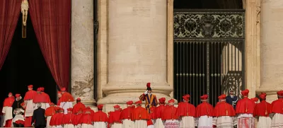 FILE - Cardinals walk through St. Peter's Square ahead of Pope Francis' coffin at the Vatican, Wednesday, April 23, 2025. (AP Photo/Andreea Alexandru, File)