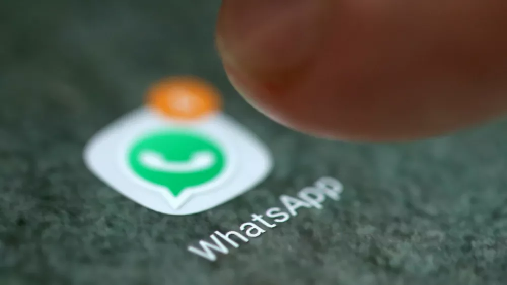 FILE PHOTO: The WhatsApp app logo is seen on a smartphone in this picture illustration taken September 15, 2017. REUTERS/Dado Ruvic/Illustration/File Photo