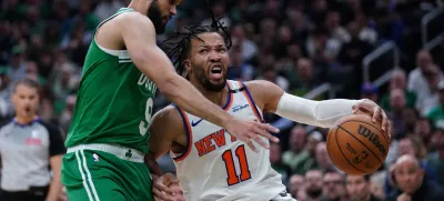 May 7, 2025; Boston, Massachusetts, USA; Boston Celtics guard Derrick White (9) defends against New York Knicks guard Jalen Brunson (11) in the second quarter during game two of the second round for the 2025 NBA Playoffs at TD Garden. Mandatory Credit: David Butler II-Imagn Images