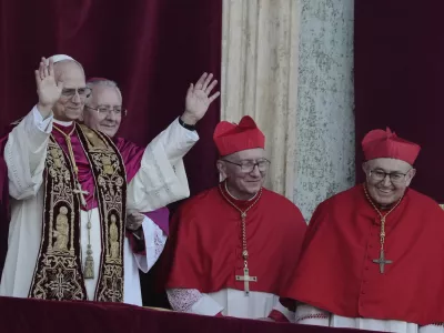 Newly elected Pope Leo XIV appears at the balcony of St. Peter's Basilica at the Vatican, Thursday, May 8, 2025. (AP Photo/Markus Schreiber)