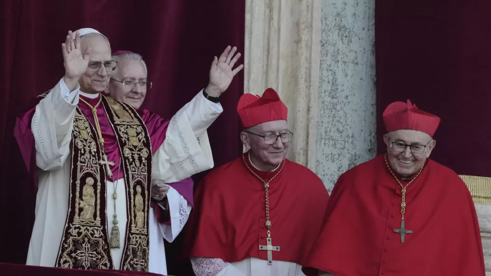 Newly elected Pope Leo XIV appears at the balcony of St. Peter's Basilica at the Vatican, Thursday, May 8, 2025. (AP Photo/Markus Schreiber)