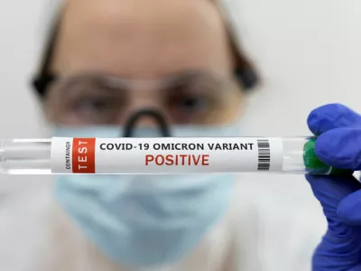 FILE PHOTO: Test tube labelled "COVID-19 Omicron variant test positive" is seen in this illustration picture taken January 15, 2022. REUTERS/Dado Ruvic/Illustration/File Photo