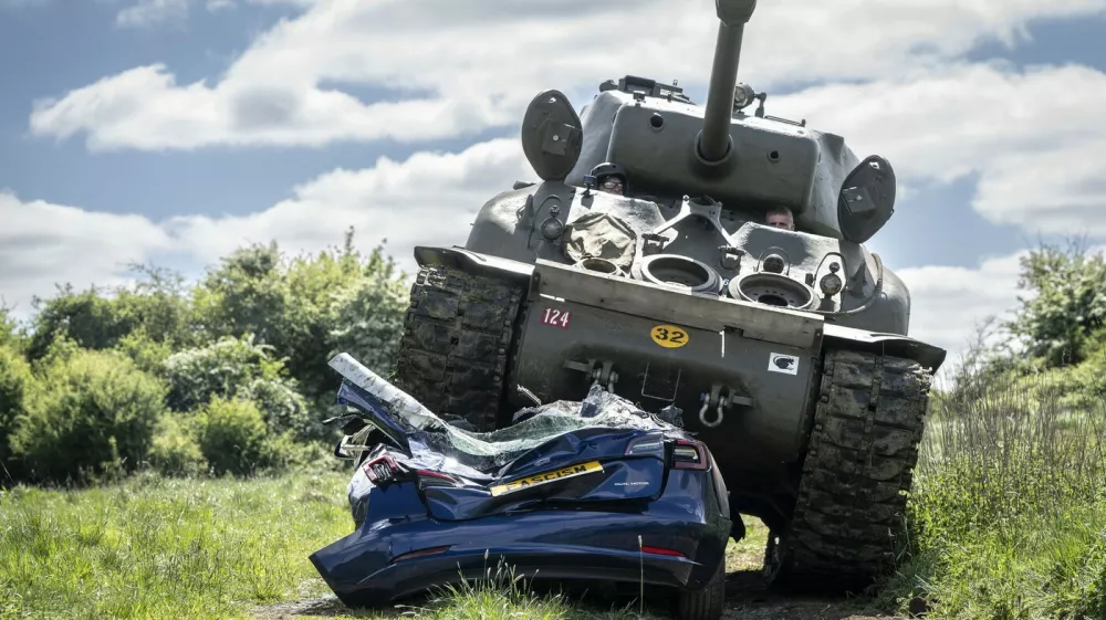 To mark VE Day a 98 year-old who served in the British army in World War Two has destroyed a Tesla with a Sherman tank. Photo released May 7 2025. Before obliterating the car, former Royal Engineer Ken Turner declared: "We crushed fascism before and we'll crush it again." The car was donated by a Tesla owner who is appalled by the support the company's owner Elon Musk has given to the far-right in Europe. Musk has backed the AfD in Germany and gave a Nazi salute at a Trump rally. Speaking from inside the Sherman - which also served in the war, fighting Nazis in Normandy - Ken said: "I'm old enough to have seen fascism the first time around, now it's coming back. Elon Musk, the richest man in the world, is using his immense power to support the far-right in Europe and his money comes from Tesla cars. Well I've got this message for Mr Musk. We've crushed fascism before and we'll crush it again. Let's go!",Image: 996343668, License: Rights-managed, Restrictions: Editorial use, commercial use may require additional licenses. We don't use AI to make images which could be mistaken for news photos. AI use will be clearly indicated. Supplied on condition you ensure personal data is processed in compliance with UK GDPR, Model Release: noFptp: Profimedia