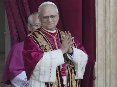 Newly elected Pope Leo XIV appears at the balcony of St. Peter's Basilica at the Vatican, Thursday, May 8, 2025. (AP Photo/Markus Schreiber)