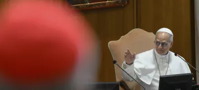 Pope Leo XIV meets the College of Cardinals in the New Synod Hall at the Vatican, Saturday, May 10, 2025. (Vatican Media via AP)