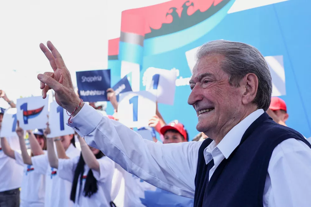 Leader of the Democratic party Sali Berisha waves to his supporters during an electoral rally in Belsh, Albania, May 1, 2025. REUTERS/Florion Goga