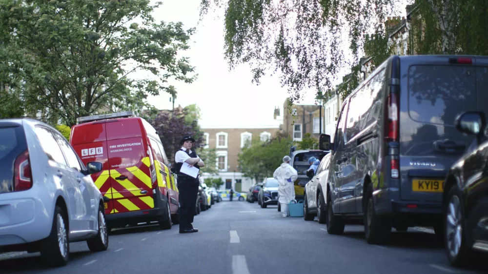 A police officer is seen in Kentish Town, near British Prime Minister Keir Starmer's house in north London, Monday, May 12, 2025. (James Manning/PA via AP)