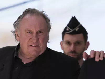 FILE - Actor Gerard Depardieu arrives to face trial for the alleged sexual assaults of two women on a film set in 2021, on March 24, 2025 in Paris. (AP Photo/Aurelien Morissard, File)